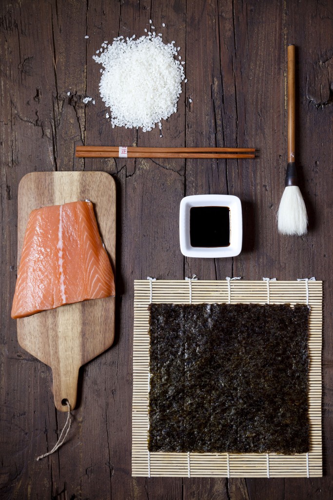ingredients for sushi on wooden table
